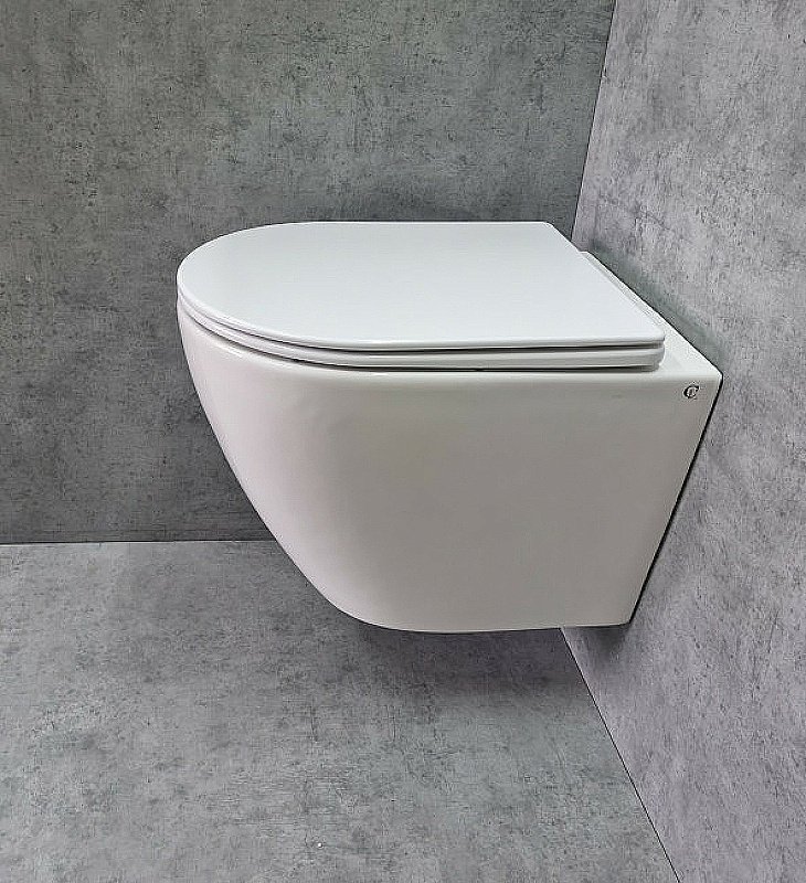 Унитаз подвесной CeramaLux TR2196 белый, безободковый, с крышкой микролифт, слив торнадо купить в интернет-магазине Sanbest