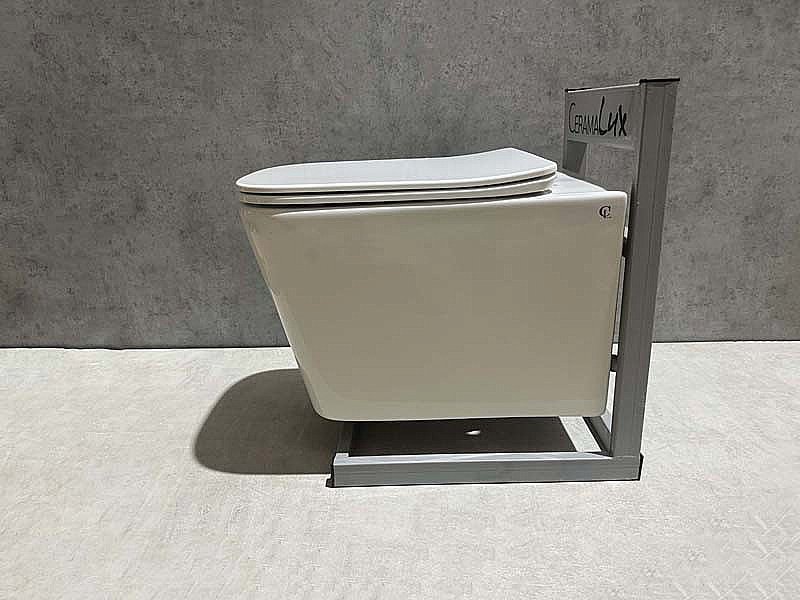 Унитаз подвесной CeramaLux TR5170 белый, безободковый, с крышкой микролифт, слив торнадо купить в интернет-магазине Sanbest