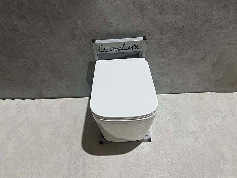 Унитаз подвесной CeramaLux TR5170 белый, безободковый, с крышкой микролифт, слив торнадо купить в интернет-магазине Sanbest